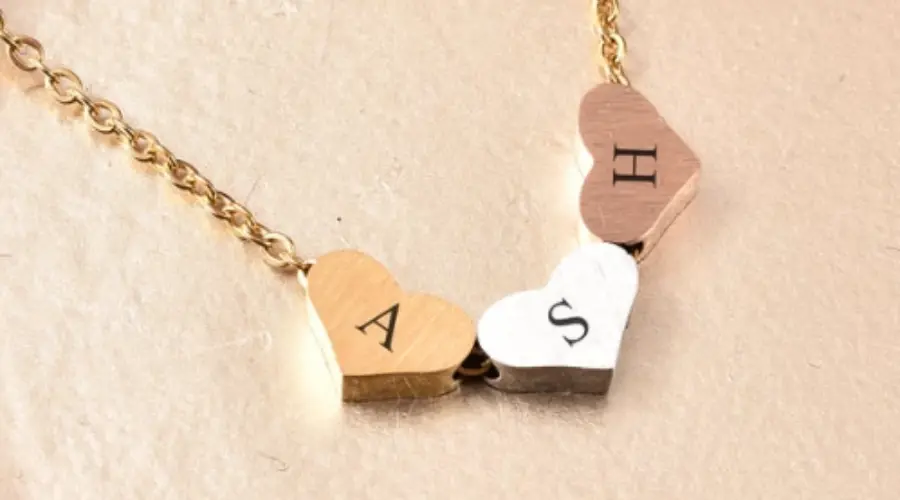 this personalized necklace with three hearts which can have 3 initials