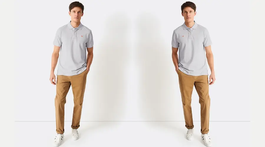 A polo shirt with formal trousers or chinos is a wardrobe staple for men.