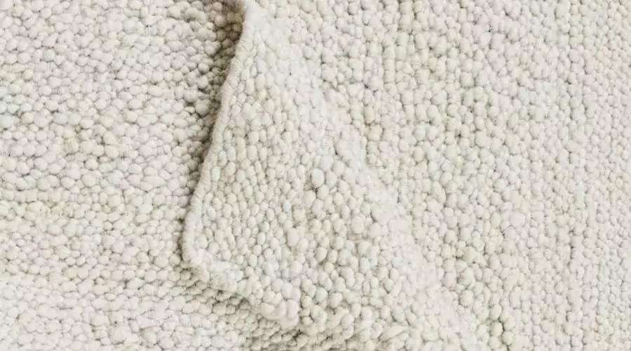 Navi handcrafted bedroom rug